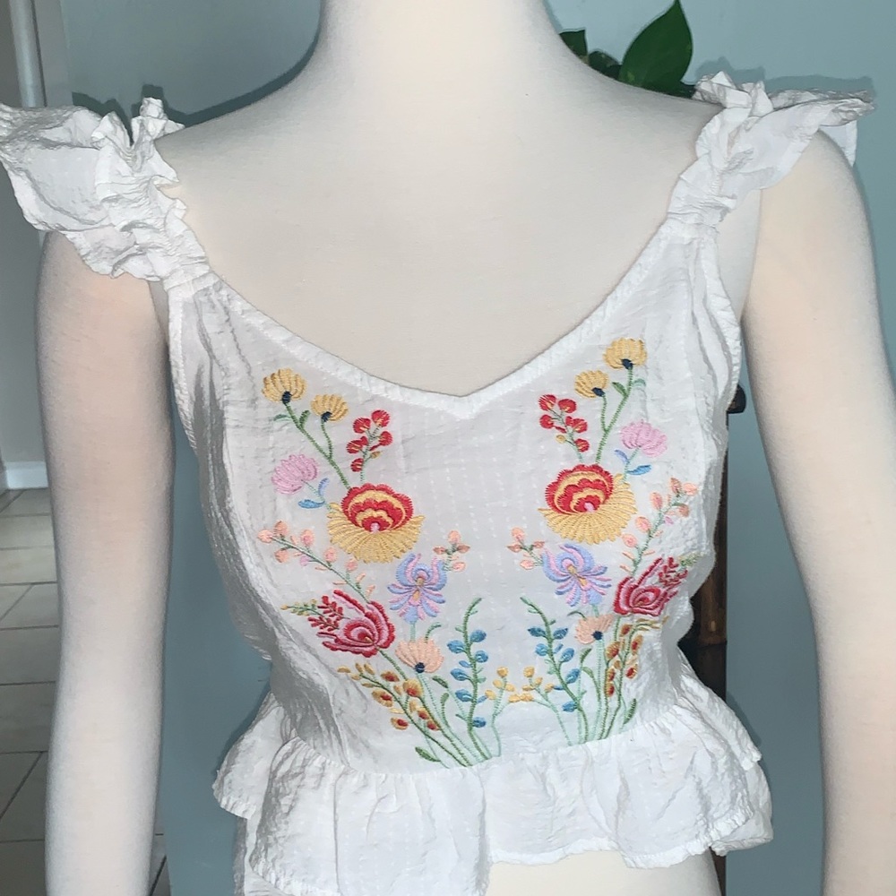Ivory Embroidered Peplum Top